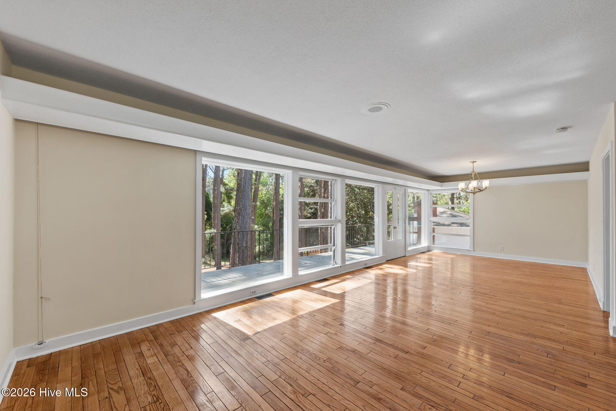 1010 Bion Butler Road Aberdeen, NC 28315 - Photo 4 of 62 Natural light from sun up to sundown with original hardwood floors