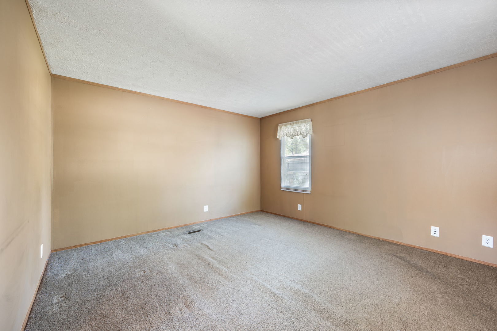 147 Parkwood Road Elgin, IL 60123 - Photo 2 of 16 an empty room with windows