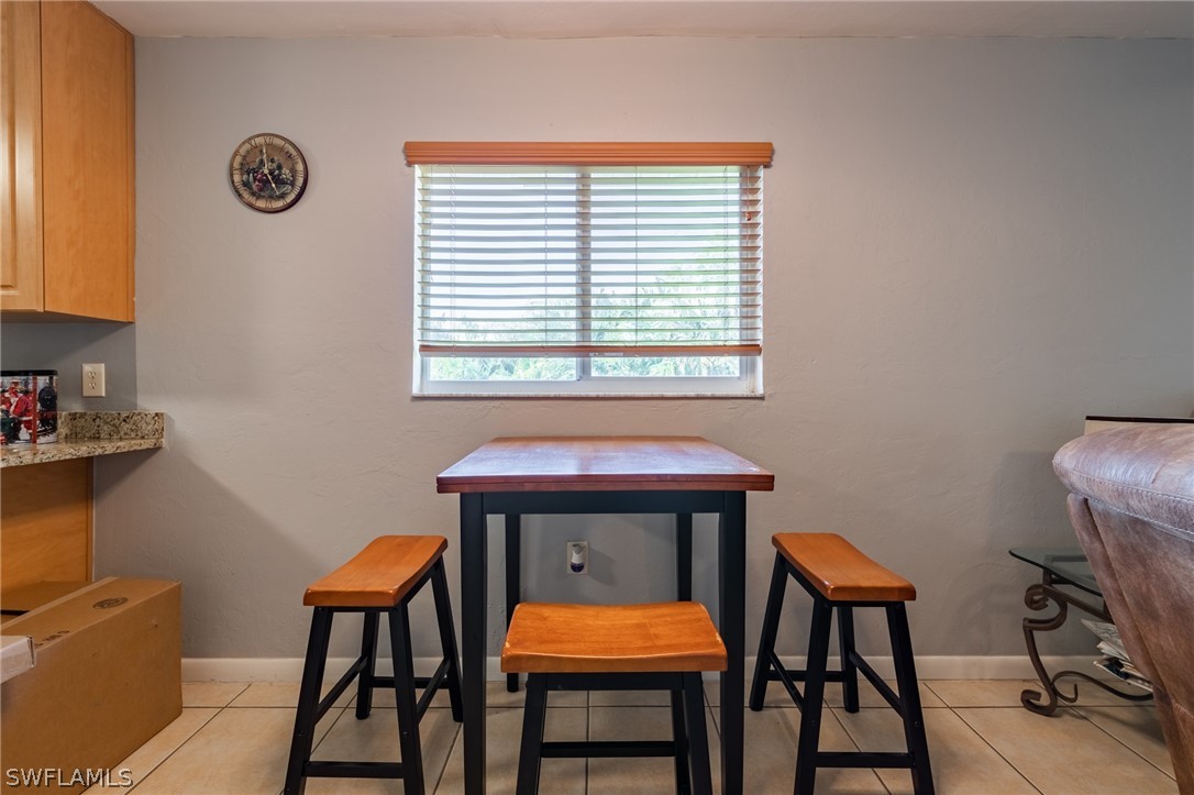 8162 Country Road, Unit 203 Fort Myers, FL 33919 - Photo 8 of 22 a view of a workspace with furniture and a window