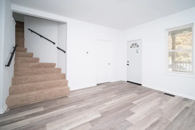 a view of an entryway with staircase