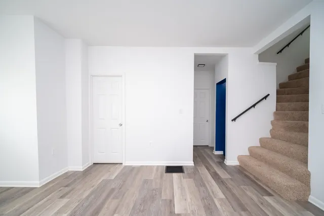 a view of entryway with wooden floor