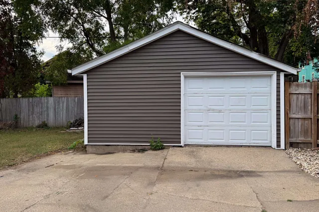 a small white house with a outdoor space
