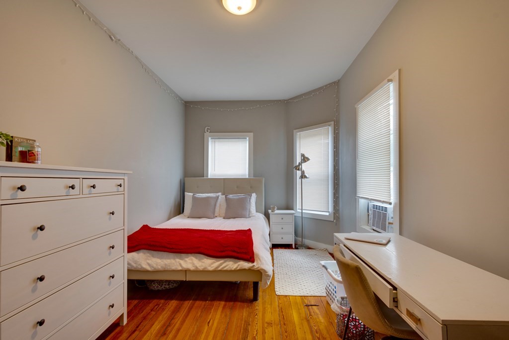 15 Hecla Street Boston, MA 02122 - Photo 12 of 33 a living room with a bed and furniture