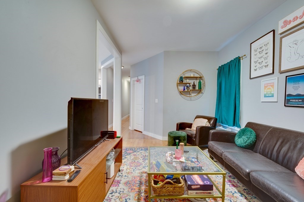 15 Hecla Street Boston, MA 02122 - Photo 18 of 33 a living room with furniture and a flat screen tv