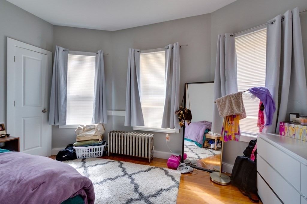 15 Hecla Street Boston, MA 02122 - Photo 26 of 33 a bedroom with bed and a window