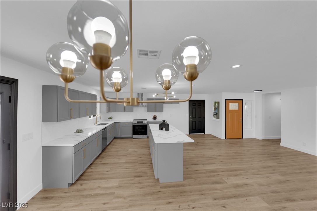 3228 Robin Circle Las Vegas, NV 89121 - Photo 13 of 45 Kitchen featuring visible vents, gray cabinets, ap