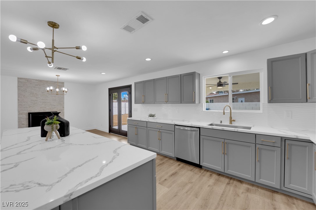 3228 Robin Circle Las Vegas, NV 89121 - Photo 16 of 45 Kitchen with visible vents, an inviting chandelier