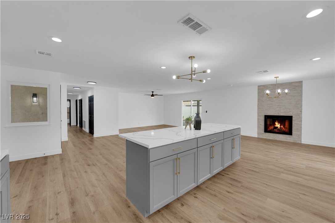 3228 Robin Circle Las Vegas, NV 89121 - Photo 22 of 45 Kitchen with visible vents, light wood finished fl