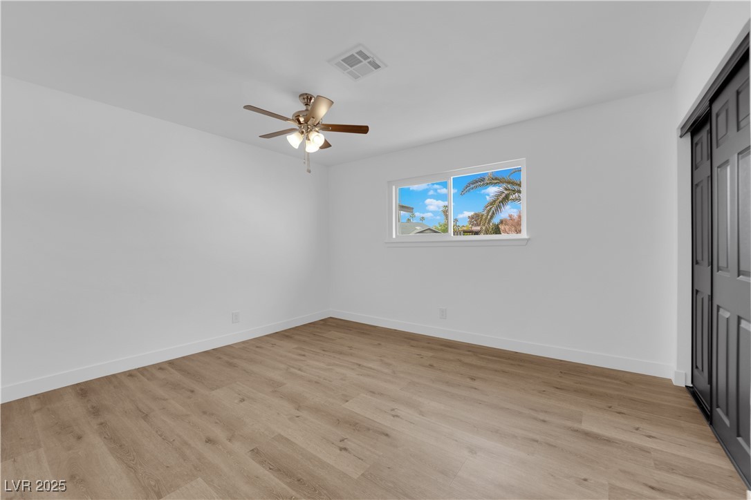 3228 Robin Circle Las Vegas, NV 89121 - Photo 25 of 45 Unfurnished room featuring a ceiling fan, light wo