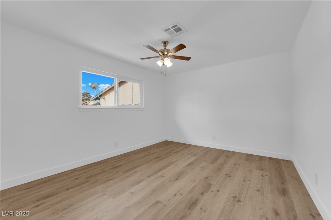 3228 Robin Circle Las Vegas, NV 89121 - Photo 26 of 45 Spare room featuring visible vents, baseboards, a