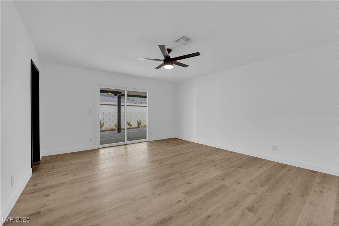 3228 Robin Circle Las Vegas, NV 89121 - Photo 30 of 45 Empty room with visible vents, baseboards, light w