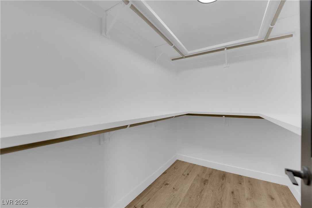 3228 Robin Circle Las Vegas, NV 89121 - Photo 31 of 45 Walk in closet with light wood-style flooring