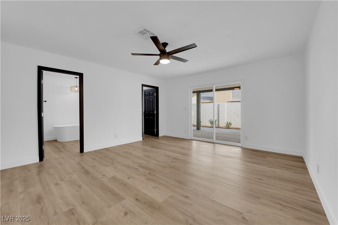 3228 Robin Circle Las Vegas, NV 89121 - Photo 32 of 45 Unfurnished bedroom featuring access to exterior,