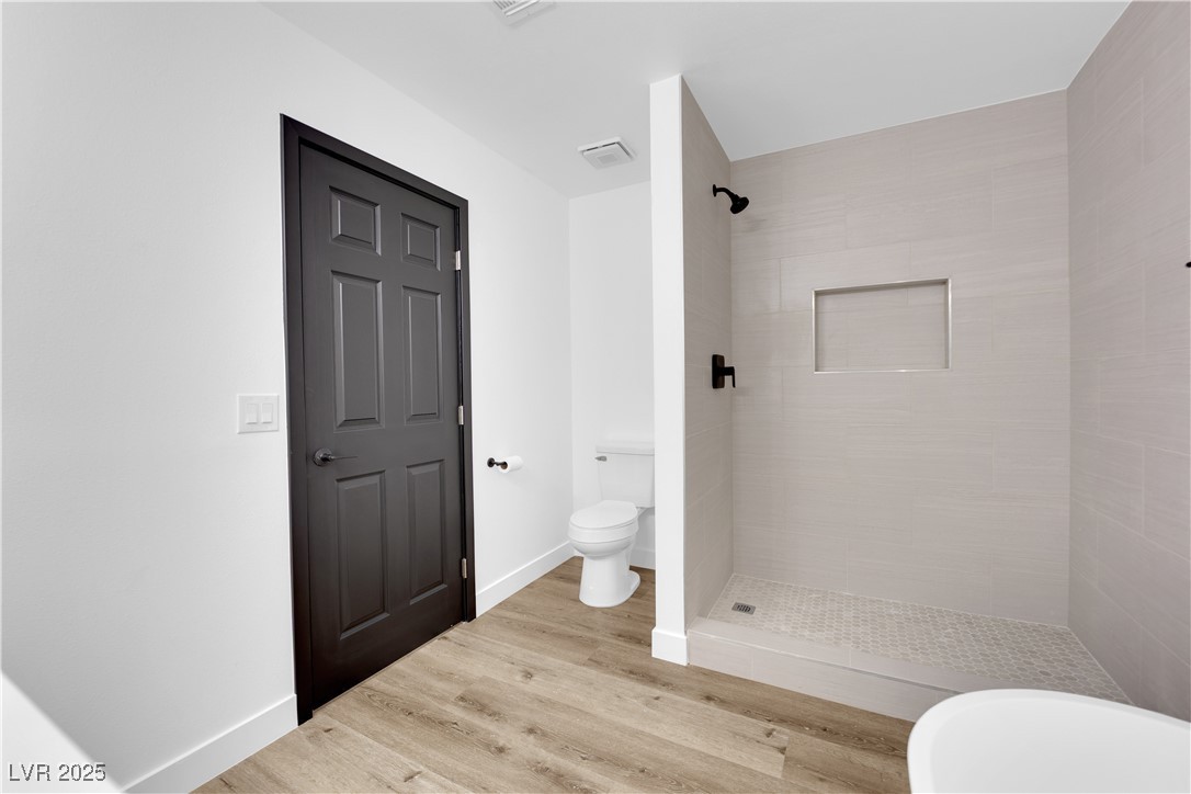 3228 Robin Circle Las Vegas, NV 89121 - Photo 35 of 45 Bathroom with visible vents, toilet, wood finished
