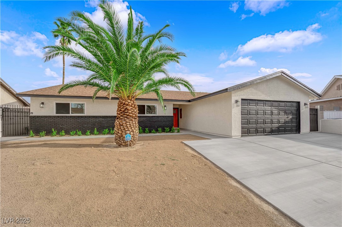 3228 Robin Circle Las Vegas, NV 89121 - Photo 4 of 45 Single story home with stucco siding, brick siding