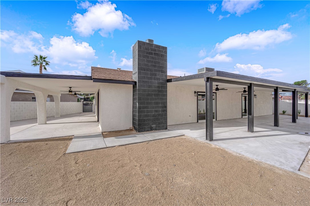 3228 Robin Circle Las Vegas, NV 89121 - Photo 41 of 45 Back of property featuring stucco siding, a patio,