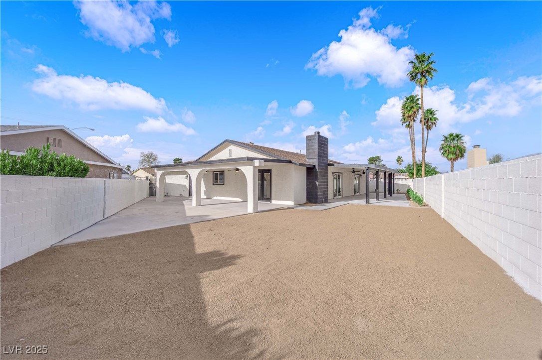 3228 Robin Circle Las Vegas, NV 89121 - Photo 44 of 45 Back of house featuring a patio area, a fenced bac