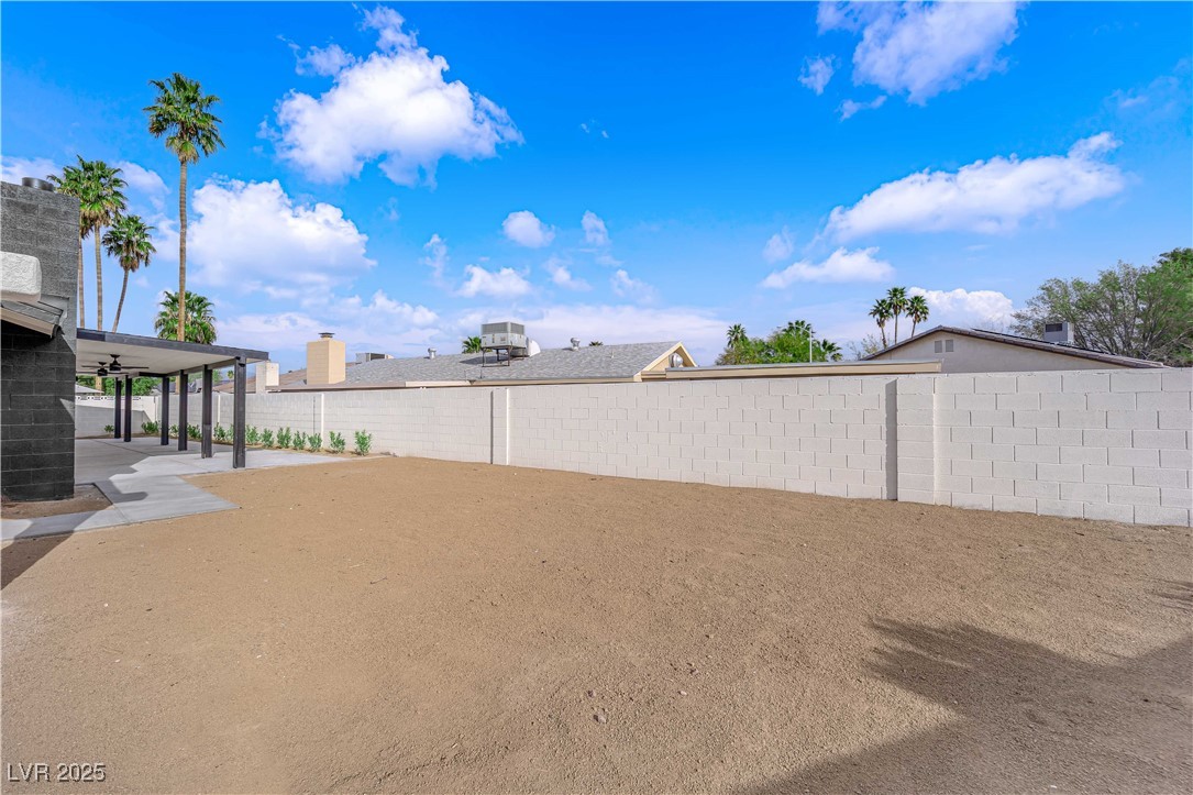 3228 Robin Circle Las Vegas, NV 89121 - Photo 45 of 45 View of yard featuring a patio area and a fenced b