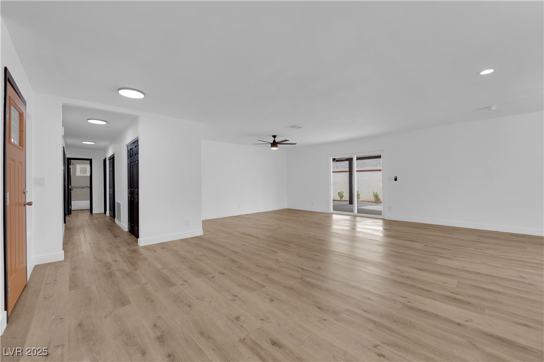 3228 Robin Circle Las Vegas, NV 89121 - Photo 6 of 45 Empty room featuring light wood finished floors, b