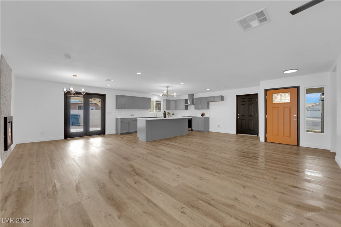 3228 Robin Circle Las Vegas, NV 89121 - Photo 8 of 45 Unfurnished living room featuring light wood-style