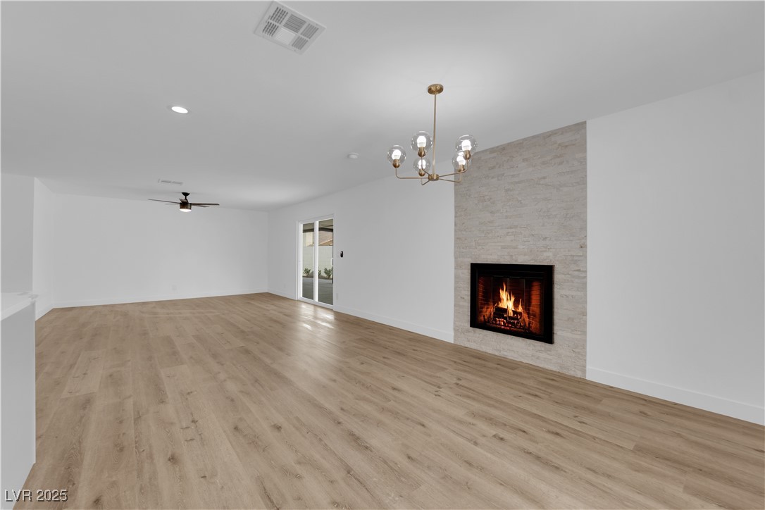 3228 Robin Circle Las Vegas, NV 89121 - Photo 10 of 45 Unfurnished living room with ceiling fan with nota