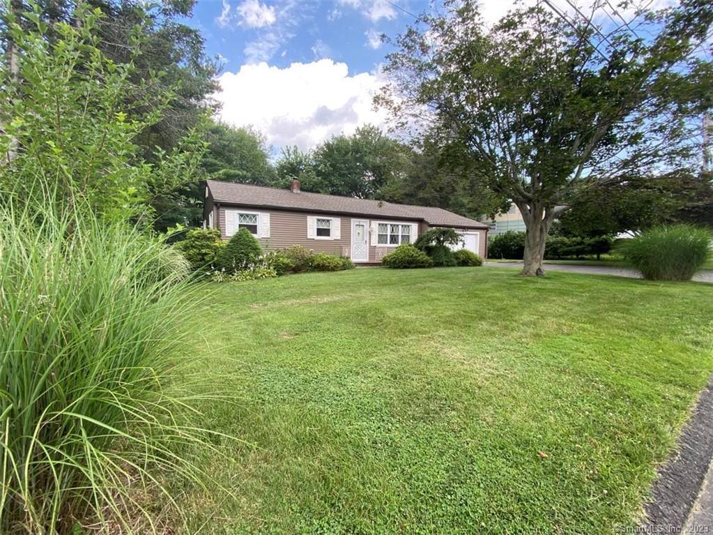 23 Meadowbrook Road Danbury, CT 06811 - Photo 1 of 1 a view of a house with yard and green space