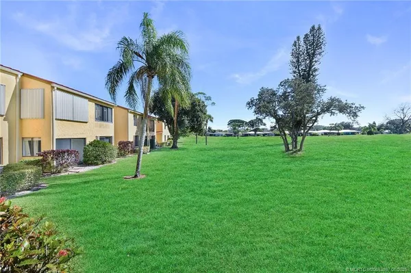 a view of a house with garden
