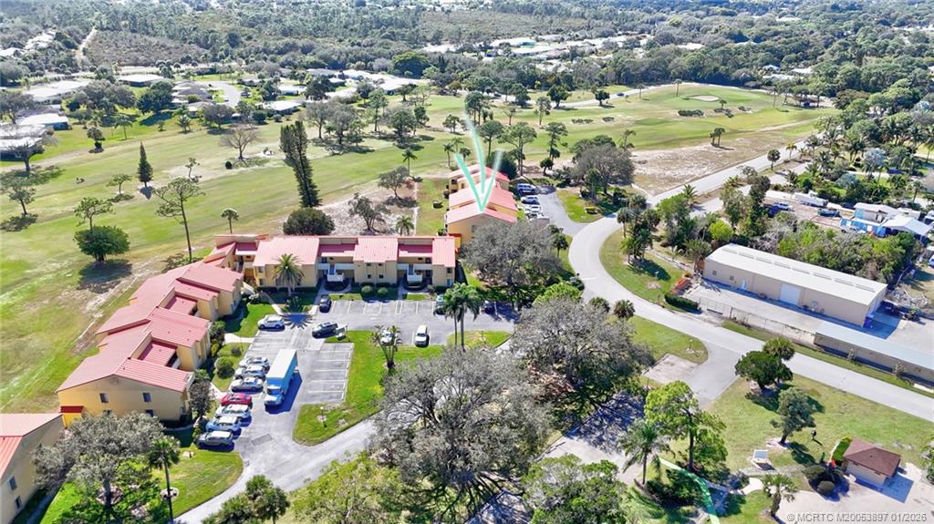 5303 Southeast Miles Grant Road, Unit L101 Stuart, FL 34997 - Photo 25 of 54 an aerial view of residential houses with outdoor space