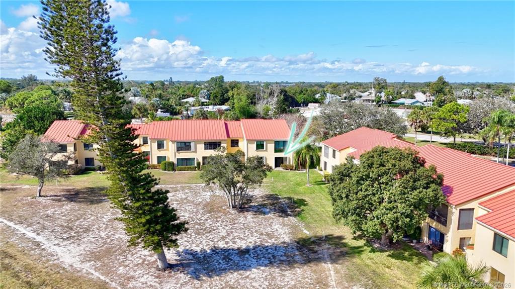 5303 Southeast Miles Grant Road, Unit L101 Stuart, FL 34997 - Photo 48 of 54 a view of a city