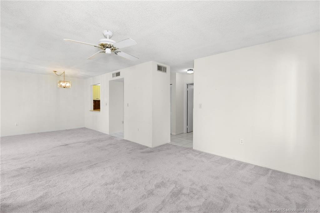 5303 Southeast Miles Grant Road, Unit L101 Stuart, FL 34997 - Photo 5 of 54 a view of an empty room