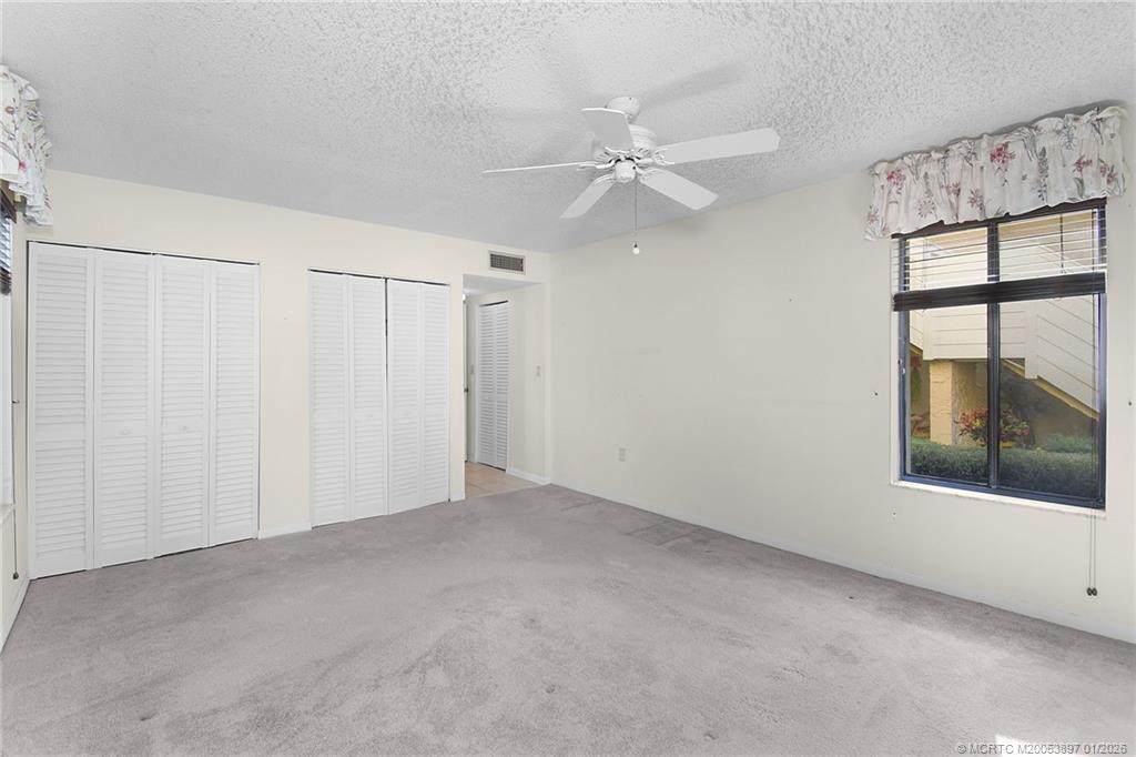 5303 Southeast Miles Grant Road, Unit L101 Stuart, FL 34997 - Photo 7 of 54 a view of an empty room with a window