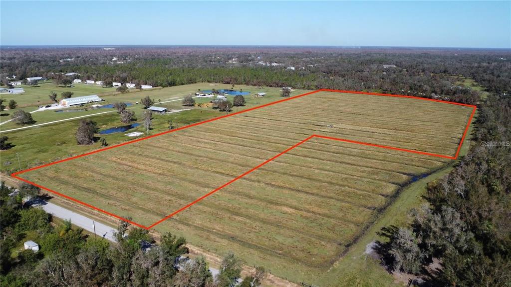 Southwest Kissimmee Road Arcadia, FL 34269 - Photo 2 of 5 an aerial view of a house