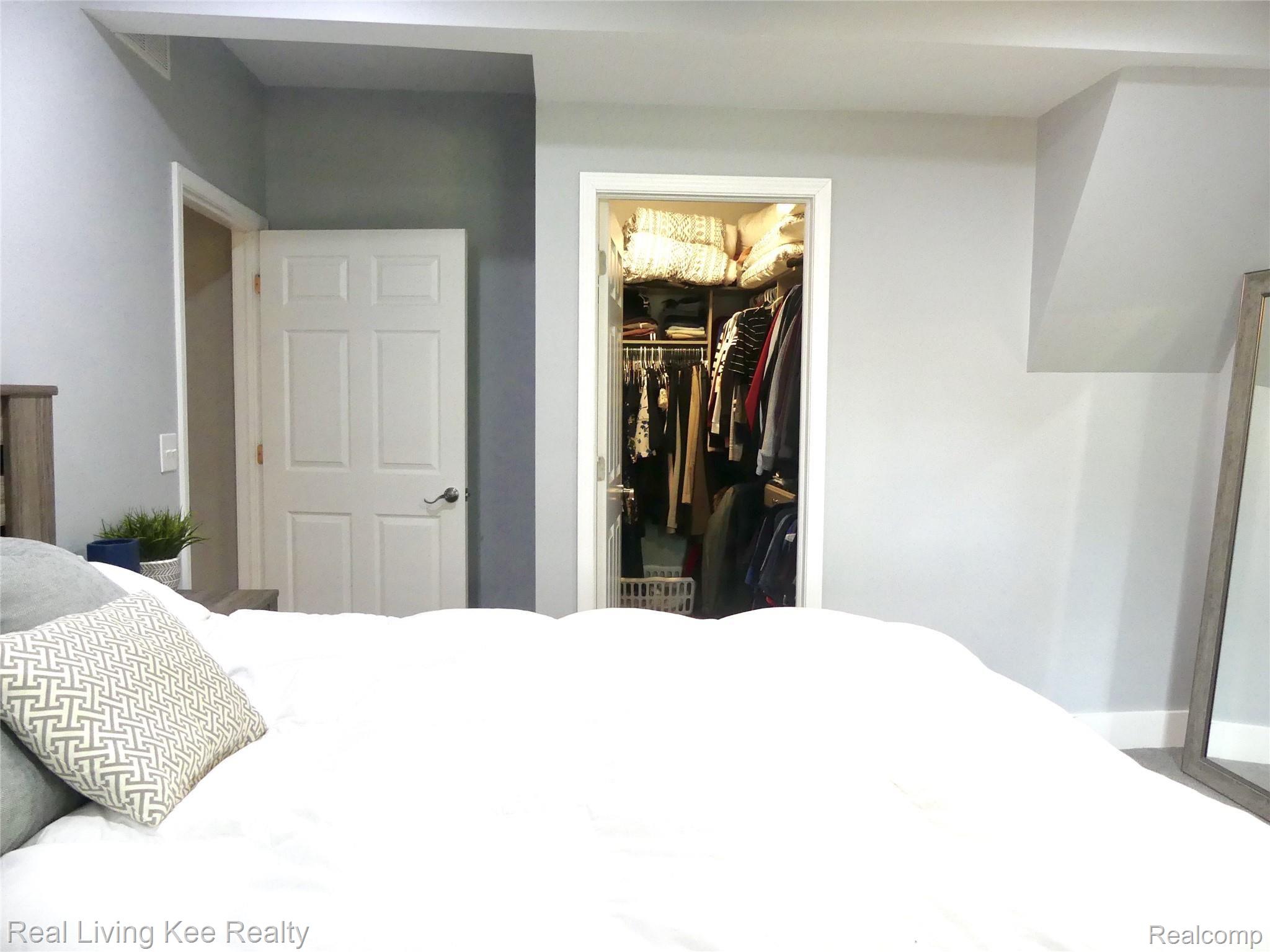 2889 Alexander Street Rochester, MI 48309 - Photo 13 of 30 Master bedroom with custom walk-in closet