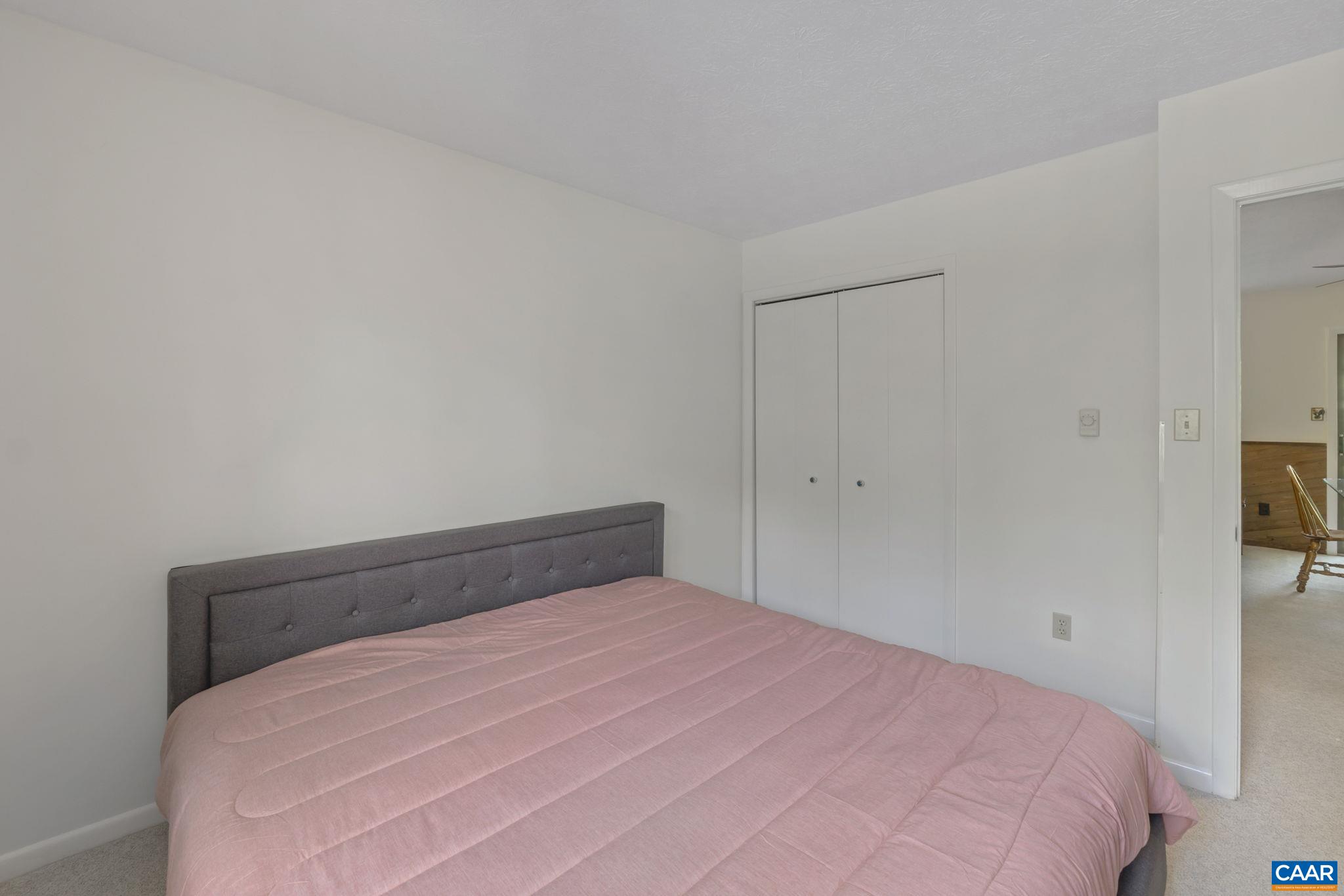 2212 Tanners Ridge Roseland, VA 22967 - Photo 20 of 32 a bedroom with a bed and a view of bathroom