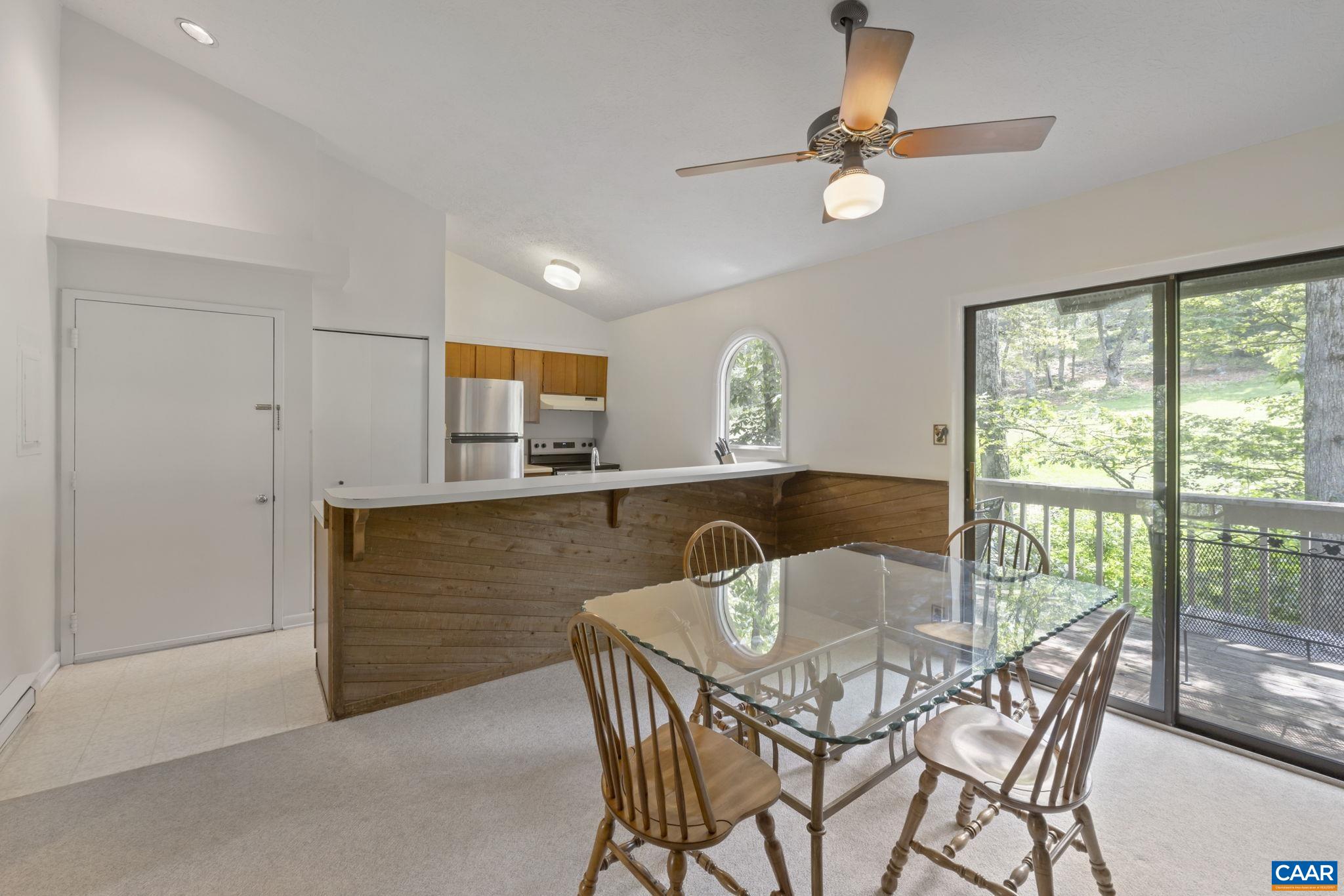 2212 Tanners Ridge Roseland, VA 22967 - Photo 2 of 32 a view of a dining room with furniture window and outside view