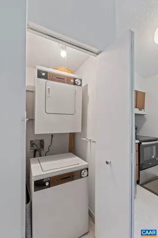 a utility room with washer and dryer