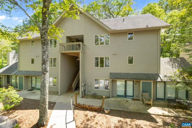 a view of balcony with wooden floor