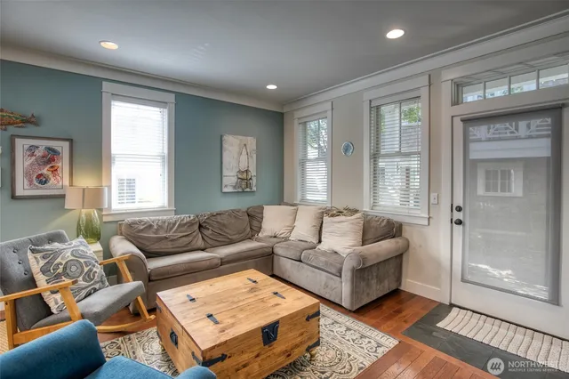a living room with furniture and a window