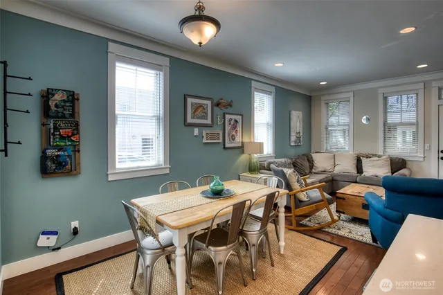 a view of a dining room with furniture window and outside view