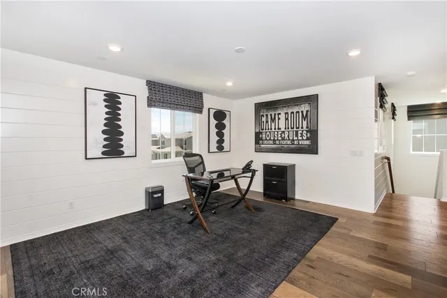 a workspace with furniture and a window