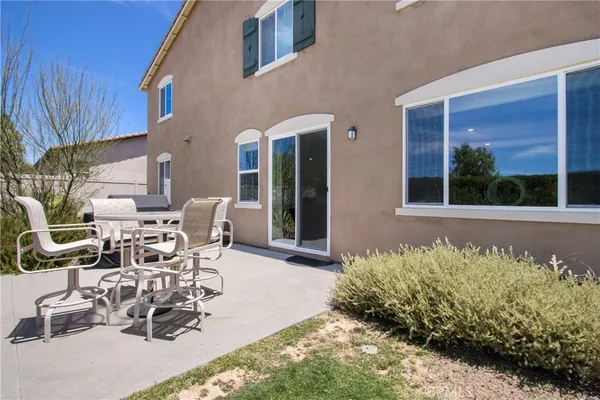 a view of a lake with a house in the background
