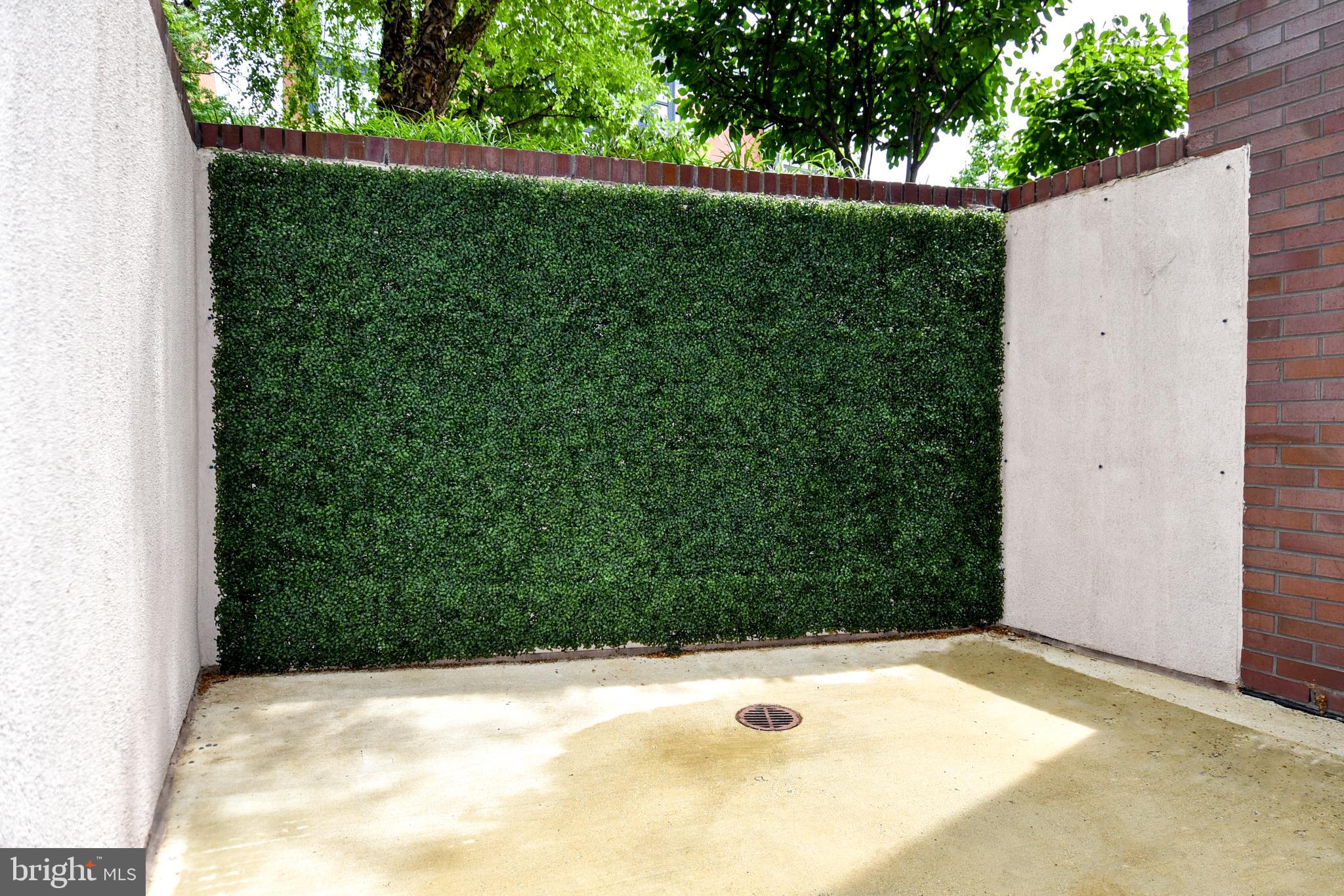 2100 11th Street Northwest, Unit G02 Washington, DC 20001 - Photo 12 of 36 a view of backyard with green space