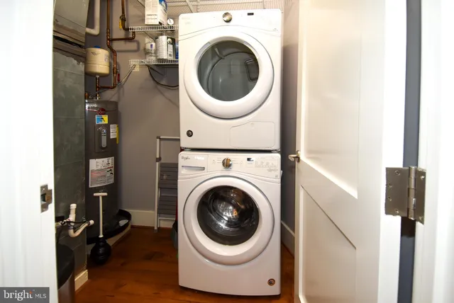 a room with pool table and a couch