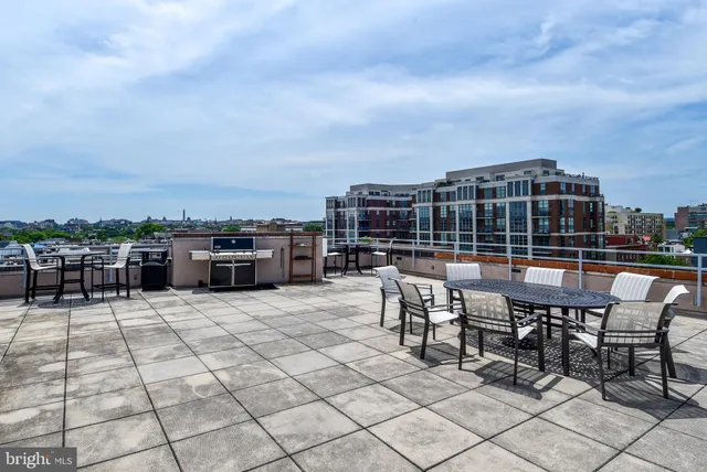 a view of a terrace with furniture