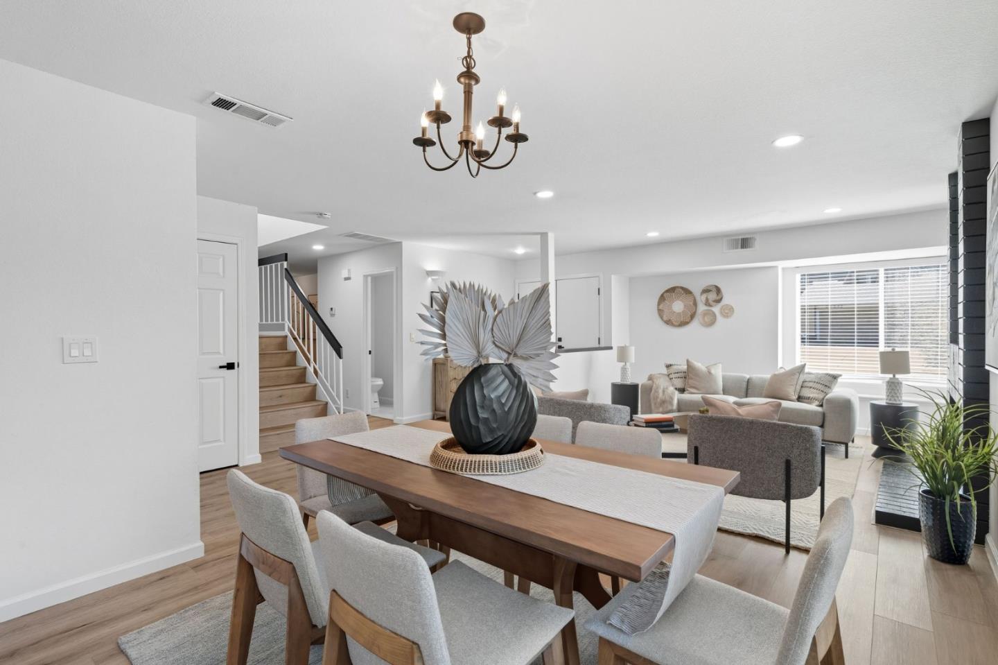 24392 Machado Court Hayward, CA 94541 - Photo 11 of 48 a view of a dining room with furniture wooden floor and chandelier