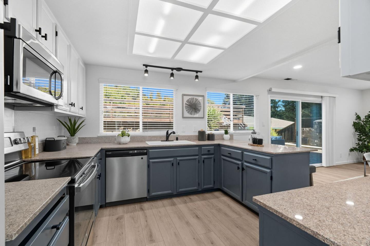 24392 Machado Court Hayward, CA 94541 - Photo 13 of 48 a kitchen with lots of counter space and a sink