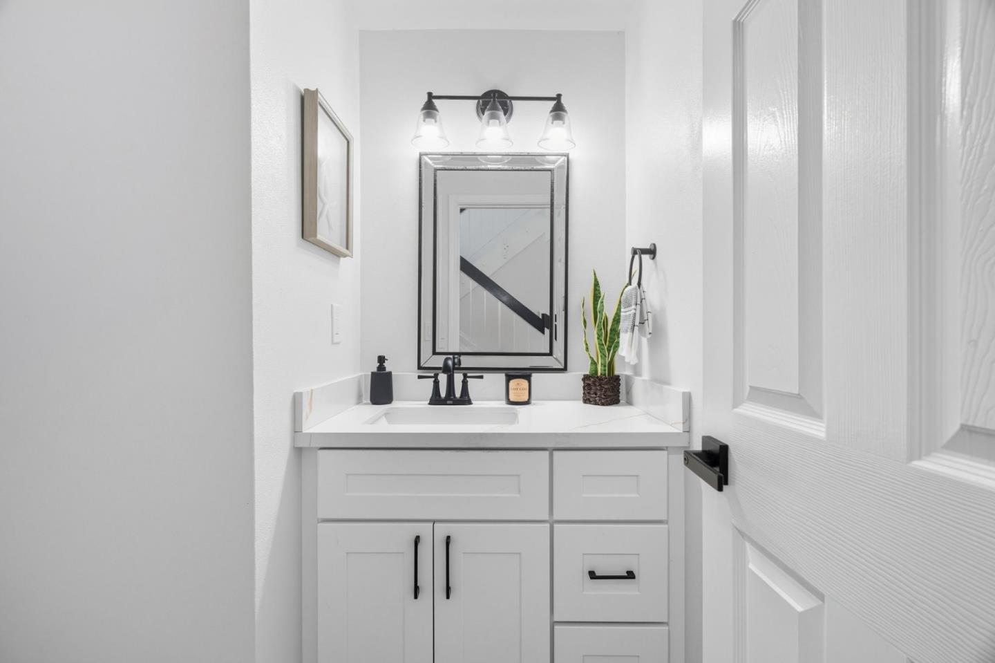 24392 Machado Court Hayward, CA 94541 - Photo 20 of 48 a bathroom with a sink and a mirror