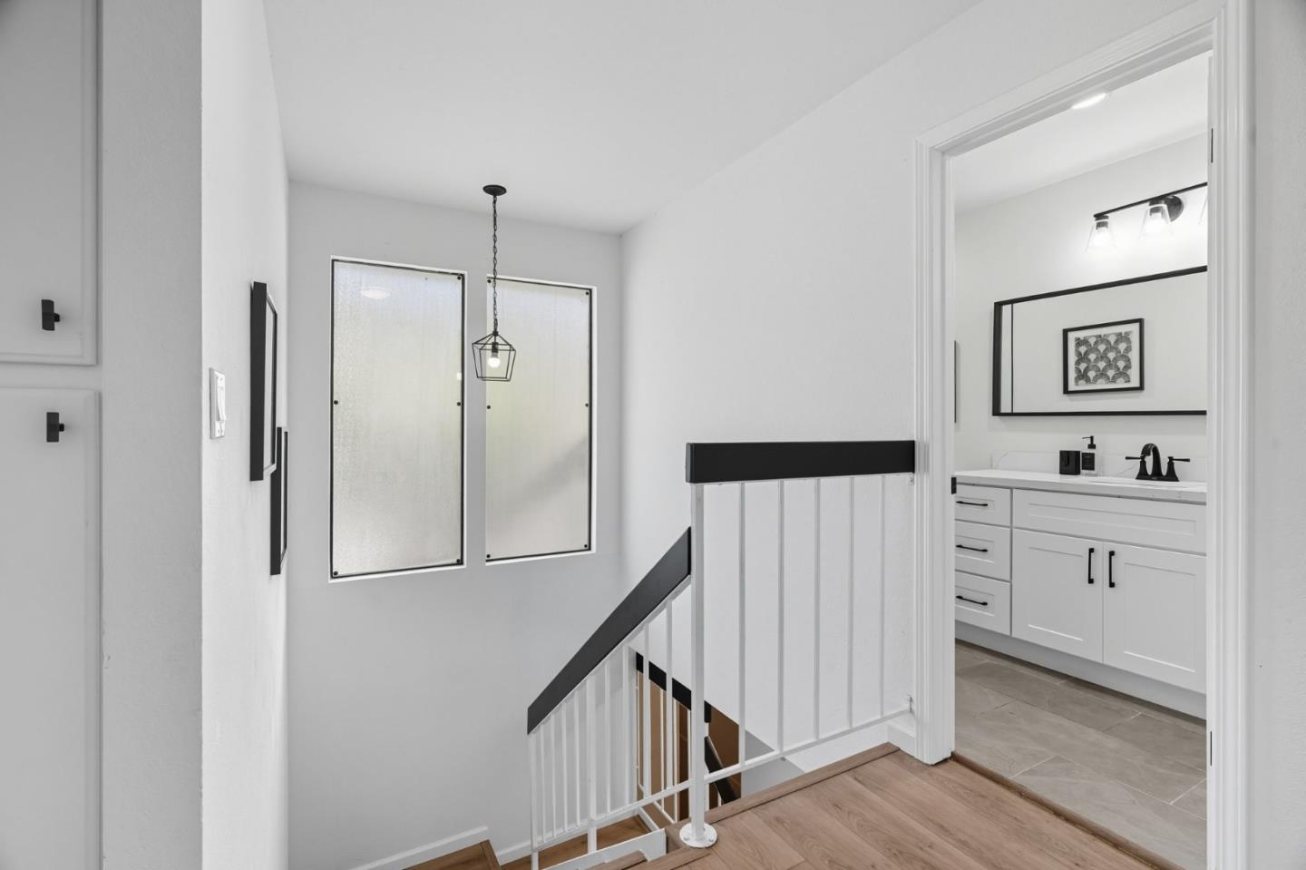 24392 Machado Court Hayward, CA 94541 - Photo 22 of 48 a spacious bathroom with a shower a sink and a mirror