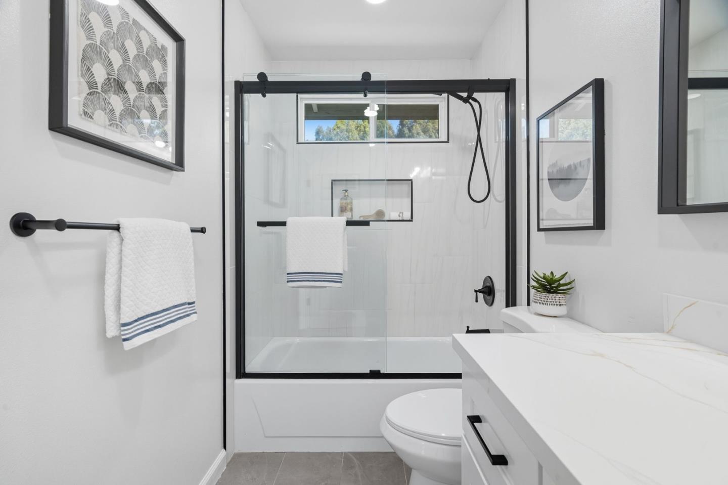 24392 Machado Court Hayward, CA 94541 - Photo 24 of 48 a bathroom with a sink a toilet and shower