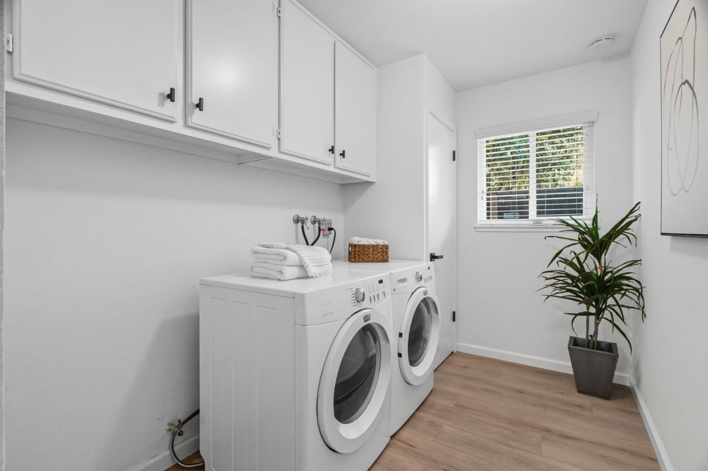 24392 Machado Court Hayward, CA 94541 - Photo 32 of 48 a utility room with dryer and washer